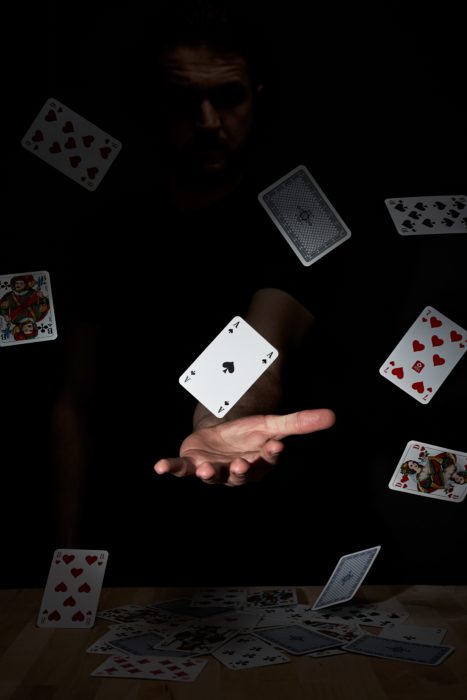 card dealing falling house of cards for AI